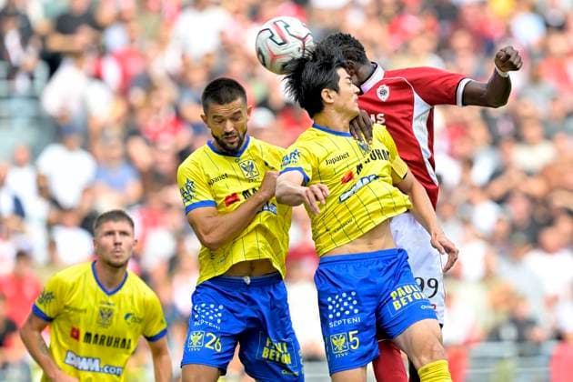 Royal Antwerp FC v Sint-Truidense VV - Jupiler Pro League DEURNE, BELGIUM - AUGUST 30 : Taniguchi Shogo defender of Sint-Truidense VV battles for the ball with Narh Luis forward of Royal Antwerp FC during the Jupiler Pro League match between Royal Antwerp FC and Sint-Truidense VV on August 30, 2026 in Deurne, Belgium, 30 08 2026 Deurne Belgium  Copyright: xSesx