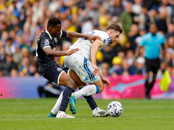 Leeds, England, 30th August 2026. Mamadou Sangare of Brentford tackles Anton Stach of Leeds United during the Leeds United vs Brentford Premier League match at Elland Road, Leeds. Picture credit should read: James Baylis Sportimage EDITORIAL USE ONLY. No use with unauthorised audio, video, data, fixture lists, club league logos or live services. Online in-match use limited to 120 images, no video emulation. No use in betting, games or single club league player publications. SPI_028_JB_Leeds_Brentford SPI-4950-0027