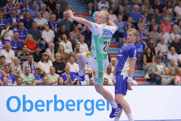 August 30, 2026, xtgx, Opel HBL Handball, VfL Gummersbach vs. SC Magdeburg emspor, from left: Magnus Saugstrup (Magdeburg), 23, takes a shot, goal scorer, scores a goal, Gummersbach