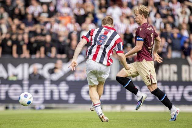 TILBURG - (lr) Devin Haen of Willem II scores the 2-2 past Maas Willemsen of SC Heerenveen during the Dutch Eredivisie match between Willem II and SC Heerenveen at the Koning Willem II Stadion on 30 August 2026 in Tilburg, the Netherlands. MORITZ MUELLER ANP 2026 27 Eredivisie xVIxANPxSportx xxANPxIVx 566601405 originalFilename: 566601405.jpg