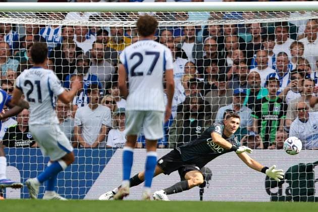 Emiliano Martinez of Chelsea saves a shot from Olivier Boscagli of Brighton and Hove Albion Chelsea v Brighton and Hove Albion, Premier League, Football, Stamford Bridge, London, UK, 30 08 2026, England - 30 Aug 2026London Stamford Bridge England United Kingdom EDITORIAL USE ONLY No use with unauthorised audio, video, data, fixture lists, club league logos or live services. Online in-match use limited to 120 images, no video emulation. No use in betting, games or single club league player publications. Copyright: xHanc WiredxPhotos Shutterstockx 17125813al