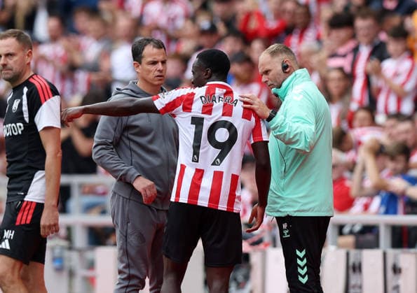 Sunderland, England, 30th August 2026. Regis Le Bris manager of Sunderland and the substituted Habib Diarra of Sunderland talk as he goes off during the Sunderland vs Fulham Premier League match at the Stadium Of Light, Sunderland. Picture credit should read: Nigel Roddis Sportimage EDITORIAL USE ONLY. No use with unauthorised audio, video, data, fixture lists, club league logos or live services. Online in-match use limited to 120 images, no video emulation. No use in betting, games or single club league player publications. SPI_027_NR_Sunderland_Fulham SPI-4949-0028