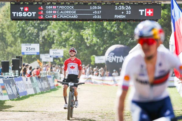 TRENTO, ITALY, AUGUST 30 Cole Punchard of Canada finished in third place and won the bronze medal at the UCI Mountain Bike World Championships—Men s Elite Cross-Country—held in Val di Sole on August 30, 2026, in Trento, Italy. Trento, Val di Sole, Trento, Italy Copyright: xJustPictures.ch FrancescoxMinghettix jp-en-EuSpIm-JP6_FRM_UCIWC_ManXCO_30Aug_000347