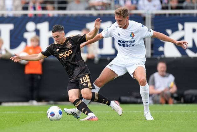 VELSEN-ZUID , 30-08-2026 , BUKO Stadion , season 2026 2027 , Dutch Eredivisie football , match between Telstar and Ajax , Picture shows Ajax player Oscar Gloukh, Telstar player Sem Valk Telstar - Ajax  x206249017x Copyright: