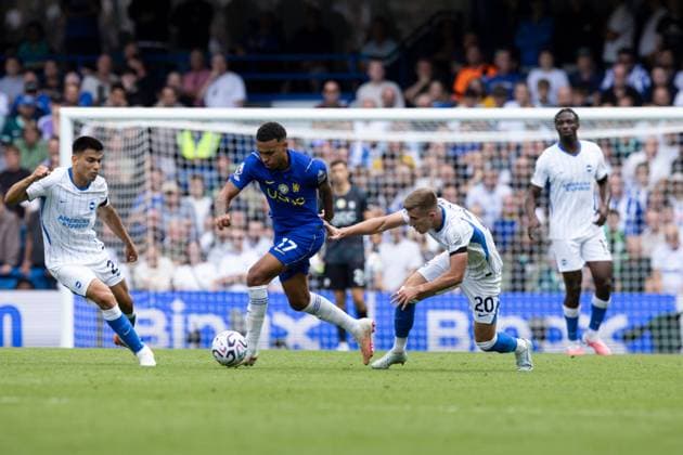 Morgan Rogers of Chelsea between Costinha of Brighton and Hove Albion and Olivier Boscagli of Brighton and Hove Albion Chelsea v Brighton and Hove Albion, Premier League Football, Football, Stamford Bridge, London, UK - 30 Aug 2026London Stamford Bridge United Kingdom EDITORIAL USE ONLY No use with unauthorised audio, video, data, fixture lists, club league logos or live services. Online in-match use limited to 120 images, no video emulation. No use in betting, games or single club league player publications.  Copyright: xIanxTuttle Shutterstockx 17119079cd