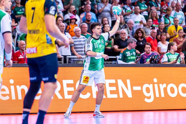 Renars Uscins of TSV Hannover Burgdorf, No. 10 from the left, TSV Hannover Burgdorf (green) vs. Rhein Neckar Löwen (yellow) on Matchday 1 of the 2026–2027 season in the Opel Handball Bundesliga, August 30, 2026, ZAG Arena Hannover, GER, Copyright: xJanxGuentherx xTSVxHannover-Burgdorfx