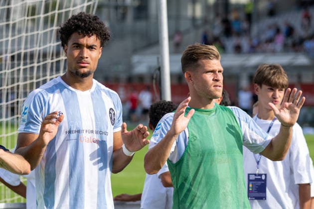 After the game, among the fans: Adrian Calderon 12 (TSV 1860 Munich), Florian Niederlechner 7 (TSV 1860 Munich), TSV 1860 Munich vs. TSV Landsberg, Soccer, Bavarian Regional League, Matchday 6, August 30, 2026. DFB regulations prohibit any use of photographs as image sequences and or quasi-video. Munich, Bavaria, Germany Copyright: xkolbert-press UlrichxGamelx