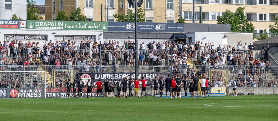 The Landsberg players are rightly celebrated by the large contingent of fans who traveled with them for earning a point. GER, TSV 1860 Munich vs. TSV Landsberg 1882, Soccer, Bavarian Regional League, Matchday 6, 2026–2027 Season, August 30, 2026 DFL and DFB regulations prohibit any use of photographs as image sequences and or quasi-video. Photo: HMB Media, Heike Feiner Copyright: HMBxMedia HeikexFeiner