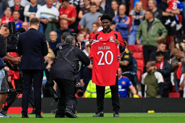 Manchester United, ManU v Ipswich Town, Premier League Carlos Baleba (20) of Manchester United is introduced to the crowd ahead of the Premier League match between Manchester United and Ipswich Town at Old Trafford, Manchester, UK on 30 August 2026. Manchester Old Trafford Greater Manchester UK Editorial use only DataCo restrictions apply See www.football-dataco.com , Copyright: xConorxMolloyx PSI-24777-0036