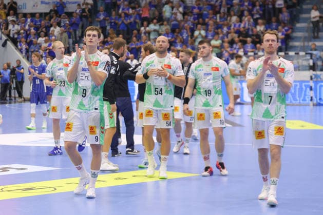 August 30, 2026, xtgx, Opel HBL Handball, VfL Gummersbach vs. SC Magdeburg emspor, from left: Magdeburg celebrates the victory; Gummersbach celebrates after the game