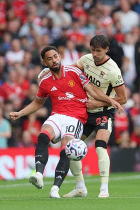 Manchester United, ManU v Ipswich Town - Premier League 2026 27 Matheus Cunha of Manchester United and Sasa Lukic of Ipswich Town challenge during the Premier League 2026 27 match between Manchester United and Ipswich Town at Old Trafford on August 30, 2026 in Manchester, England. WARNING! This Photograph May Only Be Used For Newspaper And Or Magazine Editorial Purposes. May Not Be Used For Publications Involving 1 player, 1 Club Or 1 Competition Without Written Authorisation From Football DataCo Ltd. For Any Queries, Please Contact Football DataCo Ltd on +44 (0) 207 864 9121 Manchester Old Trafford England United Kingdom Copyright: xAllstarxPicturexLibraryxLtdx