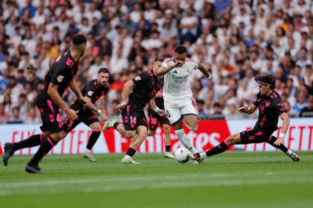 Kylian Mbappé of Real Madrid CF controls the ball during the LaLiga EA Sports match between Real Madrid CF and Málaga CF at Estadio Santiago Bernabéu on August 30, 2026, in Madrid, Spain. Photo by Manu Reino, DeFodi Images