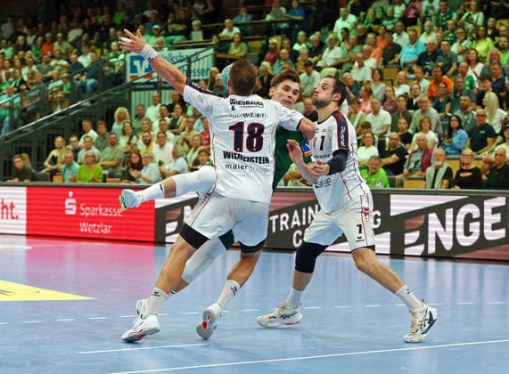August 30, 2026, xovx, Opel Handball Bundesliga, HSG Wetzlar vs. SG BBM Bietigheim; Fabian Wiederstein (SG BBM Bietigheim), Paul Kompenhans (HSG Wetzlar), Dominik Claus (SG BBM Bietigheim); Wetzlar Buderus Arena, Hesse, Germany, DE