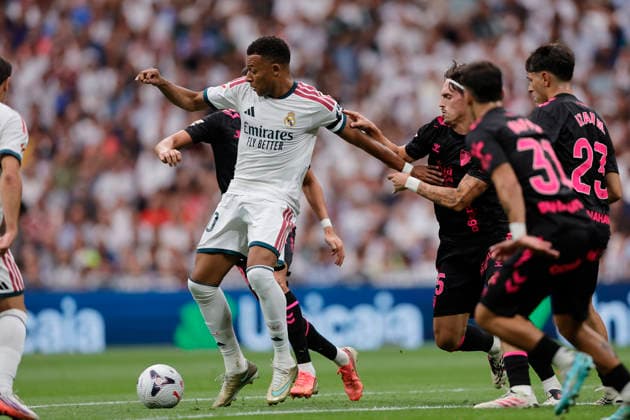 Kylian Mbappé of Real Madrid CF controls the ball under pressure during the LaLiga EA Sports match between Real Madrid CF and Málaga CF at Estadio Santiago Bernabéu on August 30, 2026, in Madrid, Spain. Photo by Manu Reino, DeFodi Images