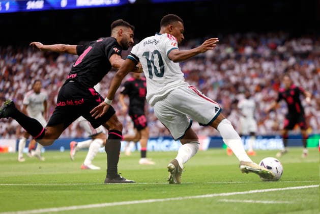 Kylian Mbappé takes a shot for Real Madrid CF during the LaLiga EA Sports match between Real Madrid CF and Málaga CF at Estadio Santiago Bernabéu on August 30, 2026, in Madrid, Spain. Photo by Manu Reino, DeFodi Images