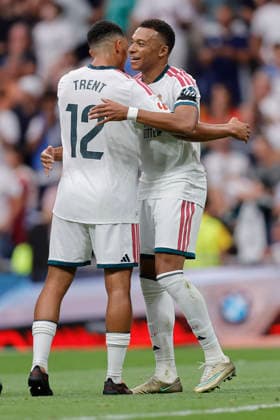 Kylian Mbappé of Real Madrid CF celebrates after scoring his team s third goal with his teammates during the LaLiga EA Sports match between Real Madrid CF and Málaga CF at Estadio Santiago Bernabéu on August 30, 2026, in Madrid, Spain. Photo by Manu Reino, DeFodi Images
