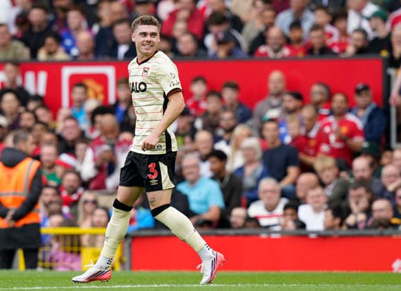 Manchester, England, 30th August 2026. Leif Davis of Ipswich Town celebrates scoring the first goal during the Manchester United, ManU vs Ipswich Town Premier League match at Old Trafford, Manchester. Picture credit should read: Andrew Yates Sportimage EDITORIAL USE ONLY. No use with unauthorised audio, video, data, fixture lists, club league logos or live services. Online in-match use limited to 120 images, no video emulation. No use in betting, games or single club league player publications. SPI_039_AY_Man_Utd_Ipswich SPI-4945-0039