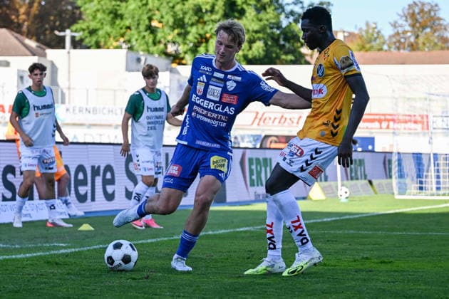 SOCCER - BL, Hartberg vs Ried HARTBERG,AUSTRIA,30.AUG.26 - SOCCER - ADMIRAL Bundesliga, TSV Hartberg vs SV Ried. Image shows Konstantin Schopp (Hartberg) and Niama Pape Sissoko (Ried).  GEPAxpictures xAvnixRetkoceri