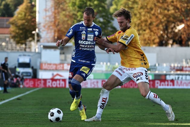 SOCCER - BL, Hartberg vs Ried HARTBERG,AUSTRIA,30.AUG.26 - SOCCER - ADMIRAL Bundesliga, TSV Hartberg vs SV Ried. Image shows Angelo Gattermayer (Hartberg) and Oliver Steurer (Ried).  GEPAxpictures xChrisxBauer