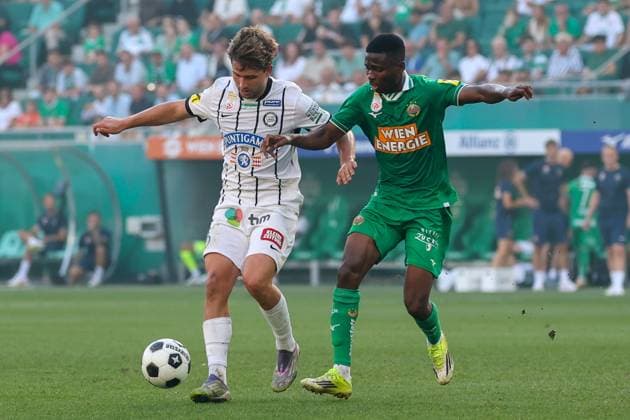 30.August. 2026 - SOCCER - 2026 27 ADMIRAL BUNDESLIGA,Round 5 SK Rapid Wien vs SK Sturm Graz Simon Seidl (Sturm Graz) and Romeo Amane (Rapid Wien) in one-on-one VIENNA VIENNA, AUSTRIA Allianz Stadion SK Rapid Wien Allianz Stadion AUSTRIA Copyright: xYigitxOermex xPsxImagesxYigitxOermex xPsxImagesx