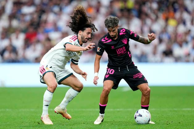 ESP: Real Madrid - Malaga CF. La Liga EA Sports. Matchday 3. Marc Cucurella of Real Madrid CF and David Larrubia of Malaga CF during the La Liga EA Sports match between Real Madrid and Malaga CF played at Santiago Bernabeu Stadium on 30 Aug 2026 in Madrid, Spain. kpng Copyright: xCesarxCebollax xPRESSINPHOTOx PS_2627_RMA_MAL_084