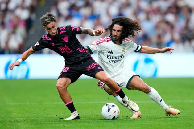 ESP: Real Madrid - Malaga CF. La Liga EA Sports. Matchday 3. Marc Cucurella of Real Madrid CF and David Larrubia of Malaga CF during the La Liga EA Sports match between Real Madrid and Malaga CF played at Santiago Bernabeu Stadium on 30 Aug 2026 in Madrid, Spain. kpng Copyright: xCesarxCebollax xPRESSINPHOTOx PS_2627_RMA_MAL_085