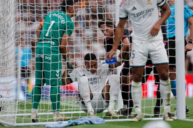 Kylian Mbappé of Real Madrid CF lay injured on the field during the LaLiga EA Sports match between Real Madrid CF and Málaga CF at Estadio Santiago Bernabéu on August 30, 2026, in Madrid, Spain. Photo by Manu Reino, DeFodi Images