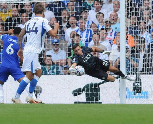 Football - 2026 2027 Premier League - Chelsea vs Brighton & Hove Albion - Stamford Bridge - Sunday 30th August 2026. New Chelsea signing Emiliano Martinez makes a one handed save 