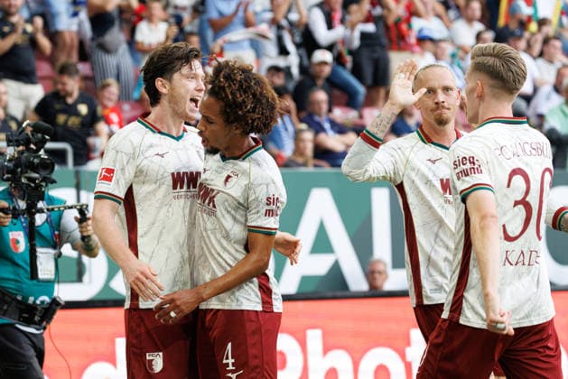 Michael Gregoritsch (11, FC Augsburg), Han-Noah Massengo (4, FC Augsburg), Anton Kade (30, FC Augsburg) und Marius Wolf (27, FC Augsburg) Tor zum 1 : 0 beim Spiel zwischen FC Augsburg v FC Schalke 04, Fussball, Herren, Bundesliga, 2026 2027, 1.Spieltag am 30.08.2026 in Augsburg, WWK ARENA. DFL and DFB regulations prohibit any use of photographs as image sequences and or quasi-video. Bayern Deutschland *** Michael Gregoritsch 11, FC Augsburg, Han Noah Massengo 4, FC Augsburg, Anton Kade 30, FC Augsburg, and Marius Wolf 27, FC Augsburg—goal for a 1–0 lead in the match between FC Augsburg and FC Schalke 04, soccer, men’s, Bundesliga, 2026–2027, Matchday 1 on August 30, 2026, in Augsburg, WWK ARENA. DFL and DFB regulations prohibit any use of photographs as image sequences and or quasi-video. Bavaria, Germany