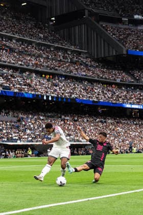 MADRID, SPAIN - AUGUST 30: Jude Bellingham of Real Madrid (L) shoots for goal under pressure from Rafita of Malaga (R) during the LaLiga EA Sports football match between Real Madrid and Malaga at Estadio Santiago Bernabeu on August 30, 2026 in Madrid, Spain. (Photo by Ricardo Nogueira Sports Press Photo) Copyright: xRicardoxNogueira SportsxPressxPhotox Sportspressphoto_SPR219917