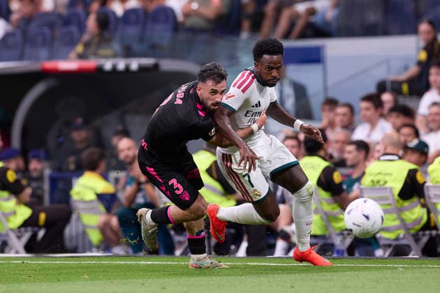 ESP LaLiga EA Sports Real Madrid vs. Málaga CF Carlos Puga of Málaga blocks Vinicius Junior of Real Madrid during the LaLiga EA Sports match between Real Madrid and Málaga CF played at Bernabéu Stadium in Madrid on August 30, 2026, in Spain. Madrid, Spain. Soccer Copyright: xAgenciaxLOFx
