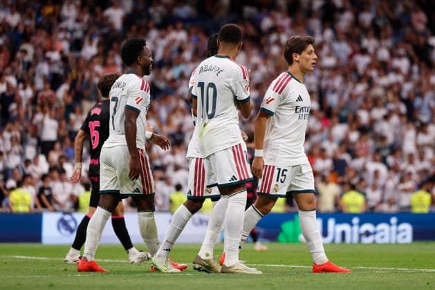 Arda Güler of Real Madrid CF celebrates with his teammates after scoring his team s fourth goal during the LaLiga EA Sports match between Real Madrid CF and Málaga CF at Estadio Santiago Bernabéu on August 30, 2026, in Madrid, Spain. Photo by Manu Reino, DeFodi Images