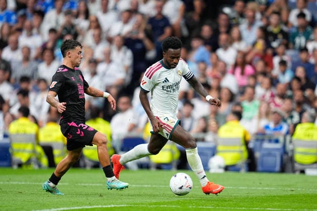 August 30, 2026, Madrid, Madrid, Spain: Vinicius Junior of Real Madrid CF runs with the ball during the Spanish League, LaLiga EA Sports, football match played between Real Madrid and Malaga CF at Bernabeu stadium on August 30, 2026, in Madrid, Spain. Madrid Spain - ZUMAa181 20260830_zaa_a181_156 Copyright: xDennisxAgyemanx