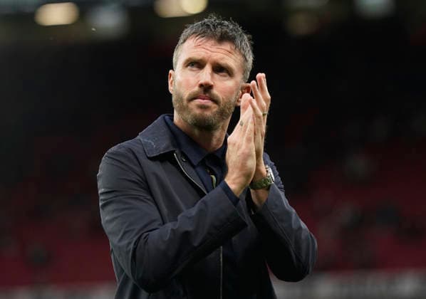 Manchester, England, 30th August 2026. Michael Carrick head coach of Manchester United, ManU claps the fans during the Manchester United vs Ipswich Town Premier League match at Old Trafford, Manchester. Picture credit should read: Andrew Yates Sportimage EDITORIAL USE ONLY. No use with unauthorised audio, video, data, fixture lists, club league logos or live services. Online in-match use limited to 120 images, no video emulation. No use in betting, games or single club league player publications. SPI_090_AY_Man_Utd_Ipswich SPI-4945-0091