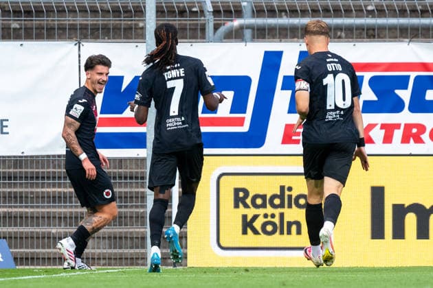 Cologne players Yannick Tonye (Viktoria Cologne, No. 07) and David Otto (Viktoria Cologne, No. 10) celebrate the 1–0 goal scored by Niklas Castelle (Viktoria Cologne, No. 44). FC Viktoria Cologne vs. SC Preussen Münster, soccer, 3. Liga, Matchday 3, 2026–2027 season, August 30, 2026. DFL and DFB regulations prohibit any use of photographs as image sequences and or quasi-video. FC Viktoria Cologne vs. SC Preussen Münster, soccer, 3rd League, Matchday 3, 2026–2027 season, August 30, 2026, Cologne Copyright: xEibner-Pressefoto ThomasxHaeslerx EP_THR