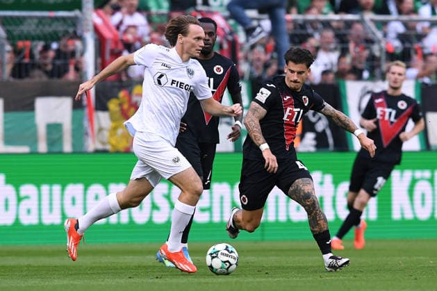 Soccer, 3rd Division, Matchday 3: FC Viktoria Köln vs. SC Preußen Münster on August 30, 2026, at Sportpark Höhenberg in Cologne. Ryan Nils Johansson (Münster, left); Niklas Castelle (Cologne, right). DFB regulations prohibit any use of photographs as image sequences and or quasi-video. xRx