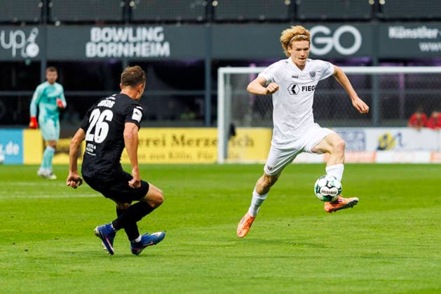 KOELN, GERMANY - AUGUST 30, 2026: Kilian Jakob (FC Viktoria Köln, 26) and Niklas Varelmann (Preußen Münster, 36) during the 3rd division match on gameday 3 between Viktoria Koeln vs. Preußen Muenster at the Sportpark Hoehenberg on August 30, 2026 in Koeln, Germany. DFL REGULATIONS PROHIBIT ANY USE OF PHOTOGRAPHS AS IMAGE SEQUENCES AND OR QUASI-VIDEO. Nordrhein-Westfalen Germany Copyright: xLeahxKohringx