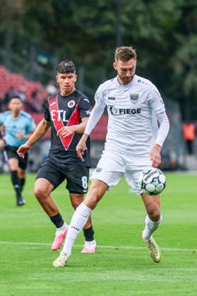 KOELN, GERMANY - AUGUST 30, 2026: Felix Higl (Preußen Münster, 33) during the 3rd division match on gameday 3 between Viktoria Koeln vs. Preußen Muenster at the Sportpark Hoehenberg on August 30, 2026 in Koeln, Germany. DFL REGULATIONS PROHIBIT ANY USE OF PHOTOGRAPHS AS IMAGE SEQUENCES AND OR QUASI-VIDEO. Nordrhein-Westfalen Germany Copyright: xLeahxKohringx