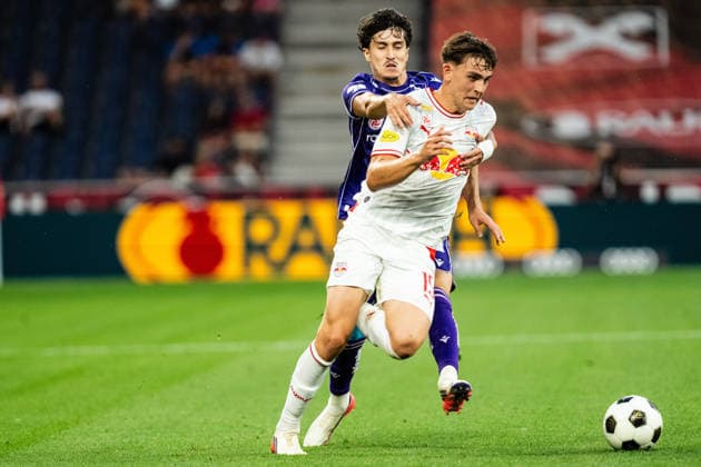 SOCCER - BL, RBS vs A.Wien SALZBURG,AUSTRIA,30.AUG.26 - SOCCER - ADMIRAL Bundesliga, Red Bull Salzburg vs FK Austria Wien. Image shows Bartosz Mazurek (RBS) and Sanel Saljic (A.Wien).  GEPAxpictures xJulioxArellano