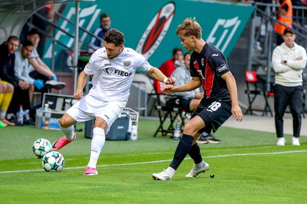 August 30, 2026, xsscx, German 3rd Division, Viktoria Cologne vs. Preußen Münster, Matchday 3, Sportpark Höhenberg, 2026–2027 Season: Charalambos Makridis of SC Preußen Münster (No. 14) in a tackle against Taylan Duman of Viktoria Köln (No. 8). DFB regulations prohibit any use of photographs as image sequences and or quasi-video. Photo: xSandraxScherningxPressefotoKochx, North Rhine-Westphalia Germany