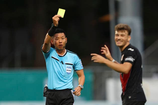 Referee Ryo Tanimoto shows a yellow card during the 3. Liga match between Viktoria Cologne and Preussen Münster at Sportpark Höhenberg on August 30, 2026, in Cologne, Germany Photo by Oliver Kaelke DeFodi Images Referee Ryo Tanimoto shows the yellow card during the 3. Liga match between Viktoria Cologne and Preussen Münster at Sportpark Höhenberg on August 30, 2026 in Cologne, Germany. Photo by Oliver Kaelke, DeFodi Images. DFB and DFL regulations prohibit any use of photographs as image sequences and or quasi-video. Photo by Oliver Kaelke, DeFodi Images.