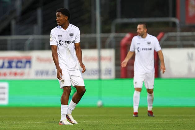 Wesley Adeh of SC Preussen Münster looks on during the 3. Liga match between Viktoria Cologne and Preussen Münster at Sportpark Höhenberg on August 30, 2026, in Cologne, Germany. Photo by Oliver Kaelke, DeFodi Images. Wesley Adeh of SC Preussen Münster looks on during the 3. Liga match between Viktoria Köln and Preussen Münster at Sportpark Höhenberg on August 30, 2026 in Cologne, Germany. Photo by Oliver Kaelke, DeFodi Images. DFB and DFL regulations prohibit any use of photographs as image sequences and or quasi-video. Photo by Oliver Kaelke, DeFodi Images.