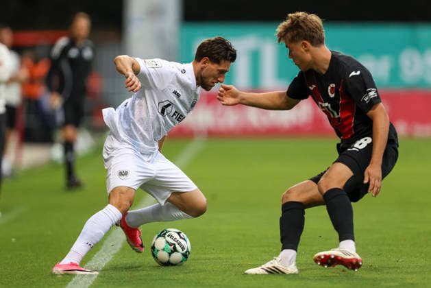 Charalambos Makridis of SC Preussen Münster and Taylan Duman of FC Viktoria Köln battle for the ball during the 3. Liga match between Viktoria Köln and Preussen Münster at Sportpark Höhenberg on August 30, 2026, in Cologne, Germany. Photo by Oliver Kaelke, DeFodi Images. Charalambos Makridis of SC Preussen Münster and Taylan Duman of FC Viktoria Köln battle for the ball during the 3. Liga match between Viktoria Köln and Preussen Münster at Sportpark Höhenberg on August 30, 2026 in Cologne, Germany. Photo by Oliver Kaelke, DeFodi Images. DFB and DFL regulations prohibit any use of photographs as image sequences and or quasi-video. Photo by Oliver Kaelke, DeFodi Images.
