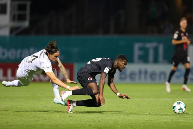 Antonio Tikvic of SC Preussen Münster and Verthomy Schilo Boboy of FC Viktoria Köln battle for the ball during the 3. Liga match between Viktoria Köln and Preussen Münster at Sportpark Höhenberg on August 30, 2026, in Cologne, Germany. Photo by Oliver Kaelke, DeFodi Images. Antonio Tikvic of SC Preussen Muenster and Verthomy Schilo Boboy of FC Viktoria Koeln battle for the ball during the 3. Liga match between Viktoria Koeln and Preussen Muenster at Sportpark Höhenberg on August 30, 2026 in Cologne, Germany. Photo by Oliver Kaelke, DeFodi Images. DFB and DFL regulations prohibit any use of photographs as image sequences and or quasi-video. Photo by Oliver Kaelke, DeFodi Images.