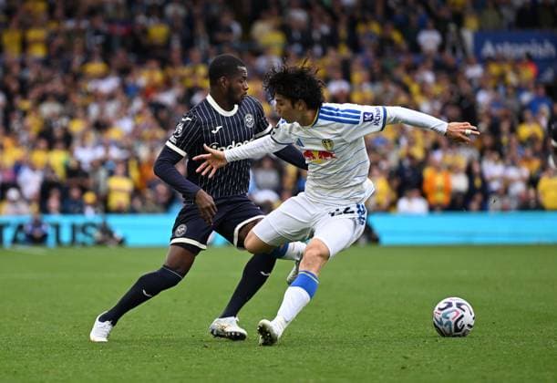 Dango Ouattara of Brentford and Ao Tanaka of Leeds United Leeds United v Brentford, Premier League Football, Football, Elland Road, Leeds, UK - 30 Aug 2026Leeds Elland Road United Kingdom EDITORIAL USE ONLY No use with unauthorised audio, video, data, fixture lists, club league logos or live services. Online in-match use limited to 120 images, no video emulation. No use in betting, games or single club league player publications.  Copyright: xAnnaxGowthorpe Shutterstockx 17119080ay