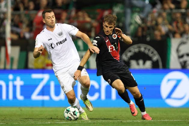 Torge Paetow of SC Preussen Münster and David Otto of FC Viktoria Köln battle for the ball during the 3. Liga match between Viktoria Köln and Preussen Münster at Sportpark Höhenberg on August 30, 2026, in Cologne, Germany. Photo by Oliver Kaelke, DeFodi Images. Torge Paetow of SC Preussen Muenster and David Otto of FC Viktoria Koeln battle for the ball during the 3. Liga match between Viktoria Koeln and Preussen Muenster at Sportpark Hoehenberg on August 30, 2026 in Cologne, Germany. Photo by Oliver Kaelke, DeFodi Images. DFB and DFL regulations prohibit any use of photographs as image sequences and or quasi-video. Photo by Oliver Kaelke, DeFodi Images