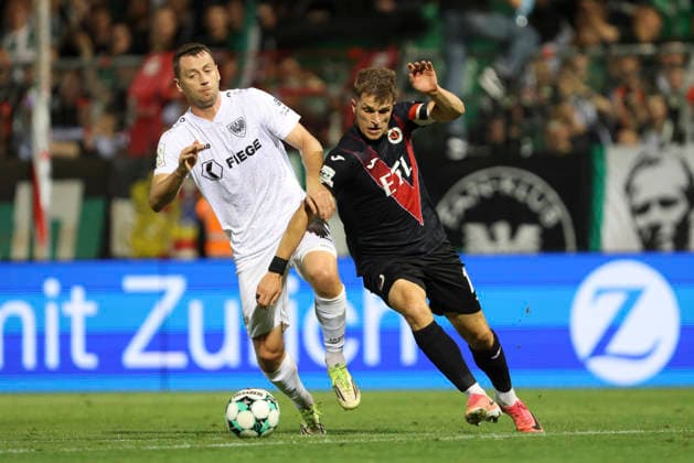 Torge Paetow of SC Preussen Münster and David Otto of FC Viktoria Köln battle for the ball during the 3. Liga match between Viktoria Köln and Preussen Münster at Sportpark Höhenberg on August 30, 2026, in Cologne, Germany. Photo by Oliver Kaelke, DeFodi Images. Torge Paetow of SC Preussen Muenster and David Otto of FC Viktoria Koeln battle for the ball during the 3. Liga match between Viktoria Koeln and Preussen Muenster at Sportpark Hoehenberg on August 30, 2026 in Cologne, Germany. Photo by Oliver Kaelke, DeFodi Images. DFB and DFL regulations prohibit any use of photographs as image sequences and or quasi-video. Photo by Oliver Kaelke, DeFodi Images