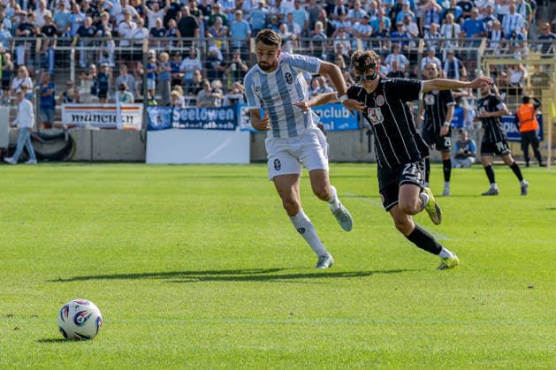 Battle for the Ball: Tackle between Raphael Wach (TSV 1860 Munich, No. 08) and Kilian Pittrich (TSV 1882 Landsberg, No. 21), GER, TSV 1860 Munich vs. TSV Landsberg 1882, soccer, Bavarian Regional League, Matchday 6, 2026–2027 season, August 30, 2026 DFL and DFB regulations prohibit any use of photographs as image sequences and or quasi-video. Photo: HMB Media, Heike Feiner Copyright: HMBxMedia HeikexFeiner