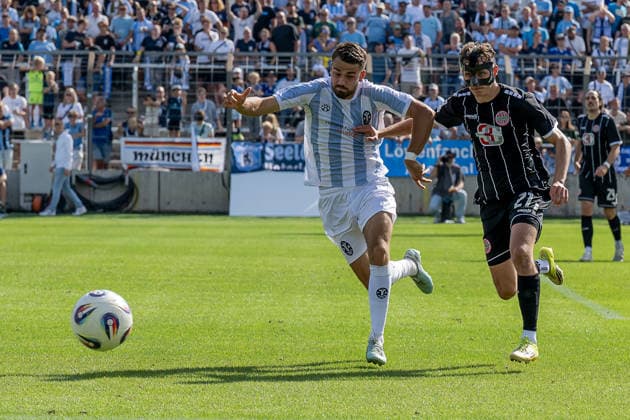 Battle for the Ball: Tackle between Raphael Wach (TSV 1860 Munich, No. 08) and Kilian Pittrich (TSV 1882 Landsberg, No. 21), GER, TSV 1860 Munich vs. TSV Landsberg 1882, soccer, Bavarian Regional League, Matchday 6, 2026–2027 season, August 30, 2026 DFL and DFB regulations prohibit any use of photographs as image sequences and or quasi-video. Photo: HMB Media, Heike Feiner Copyright: HMBxMedia HeikexFeiner