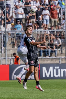 Heading duel between Lance Fiedler of TSV 1860 Munich, 47, and Tiziano Mulas of TSV 1882 Landsberg, 30 (GER), TSV 1860 Munich vs. TSV Landsberg 1882, soccer, Bavarian Regional League, Matchday 6, 2026–2027 season, August 30, 2026 DFL DFB REGULATIONS PROHIBIT ANY USE OF PHOTOGRAPHS as IMAGE SEQUENCES and or QUASI-VIDEO Photo: HMB Media, Heike Feiner Copyright: HMBxMedia HeikexFeiner